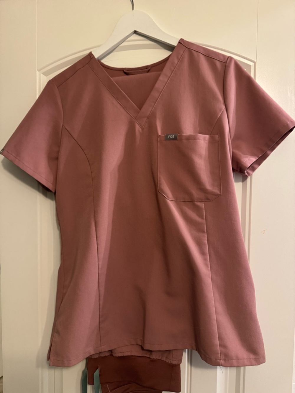 FIGS scrubs Slim Caterina and Kade pants in Mauve